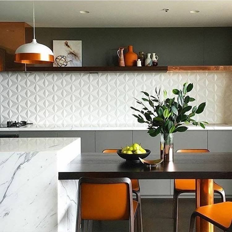 10. In this kitchen, a 3D effect wallpaper was used, making us believe there’s actual texture on the wall.