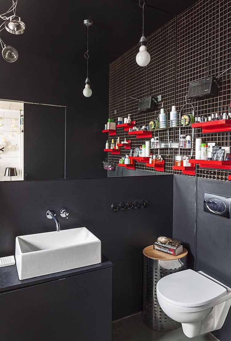 Adding vibrant colors like red to black and white decor adds a lively touch.