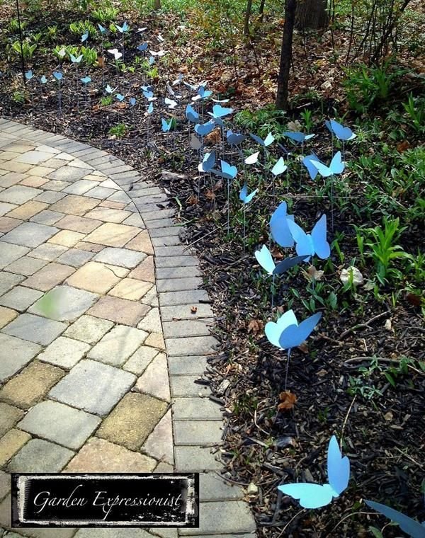 Decorate your garden with butterflies, but in this case, we are talking about artificial ones. If you want to make it yourself, just print, cut out, and use small pieces of wire to attach.