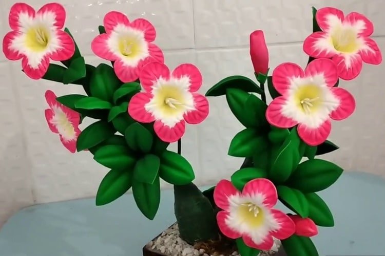 An artificial Desert Rose placed indoors as a safe decoration.