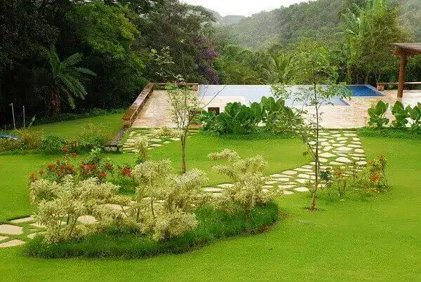 Outdoor area of the country house with garden and pool.