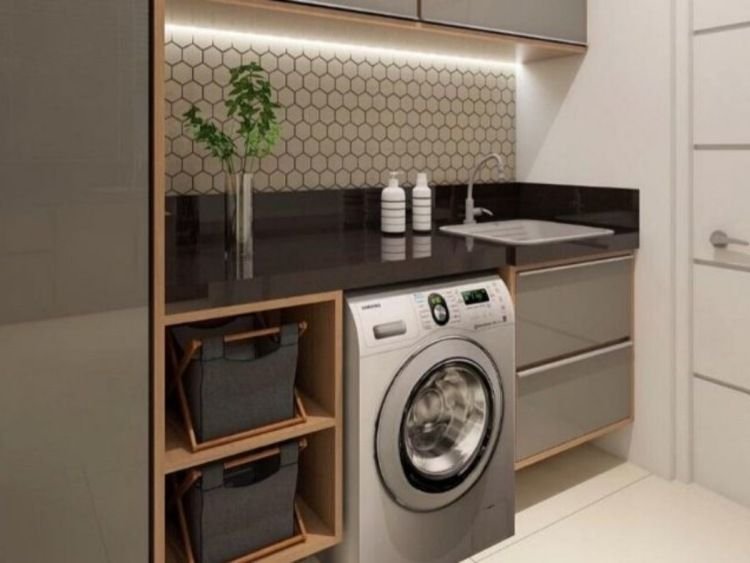 Integration of a bathroom and laundry space for efficient use of limited areas.