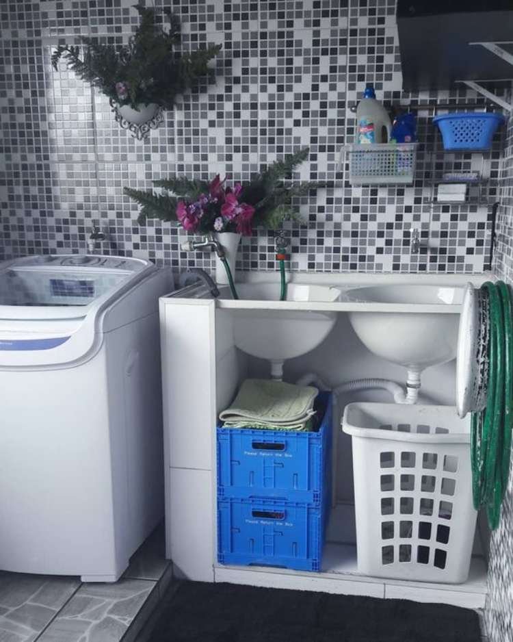 A simple and practical backyard laundry setup with essential utilities.