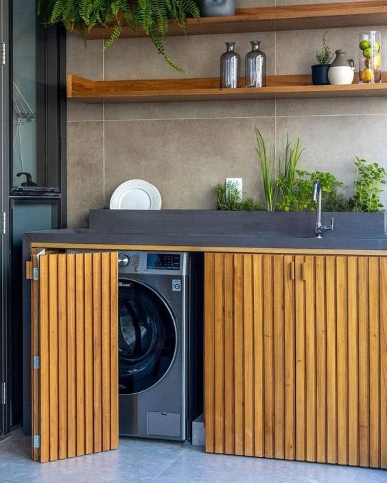 Functional cabinets in a laundry area for organized storage.