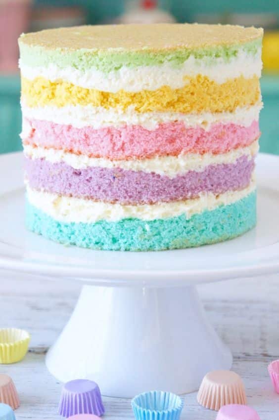 This naked cake model looks very beautiful. The lighter shades of the sponge combine well with the white frosting, creating a very nice visual.