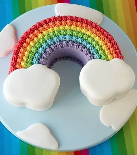 This cake literally has the shape of a rainbow. Made with icing and fondant, all these colors made it very cute.
