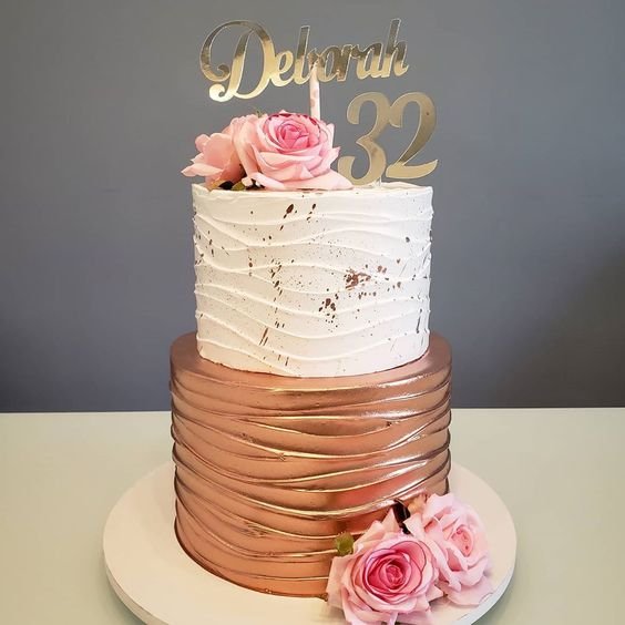 13. The delicate yet modern design makes this cake suitable for various ages.