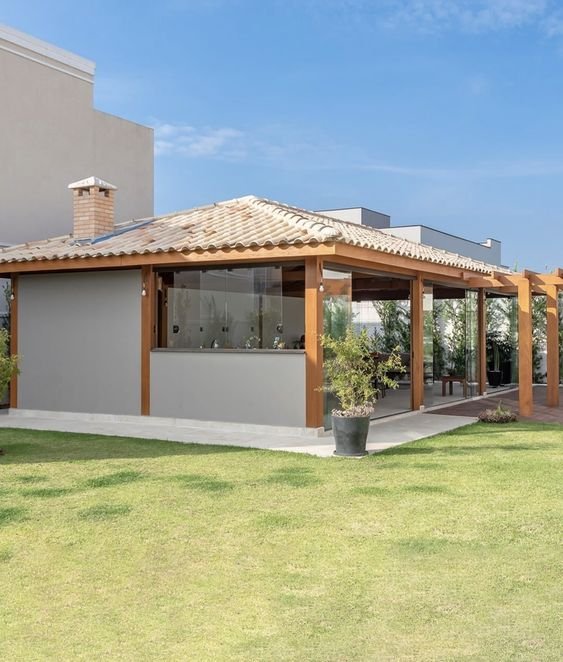 The porch structure is highlighted on the house facade, offering practical use by providing shelter against rain.