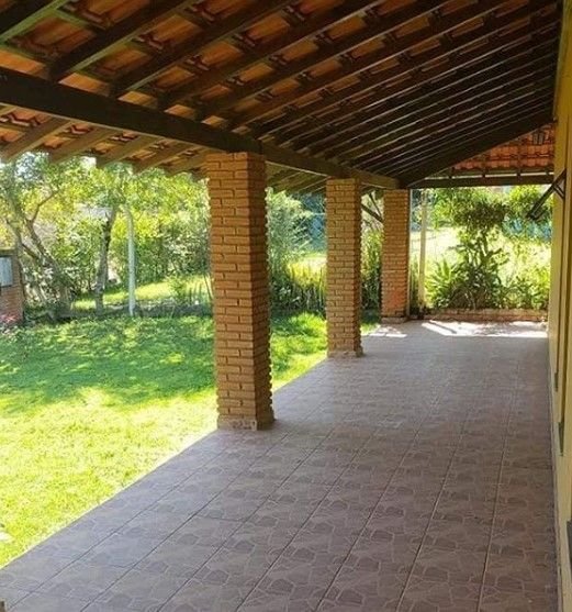 Utilizing the porch avoids the need for separate construction for gourmet areas on the property.