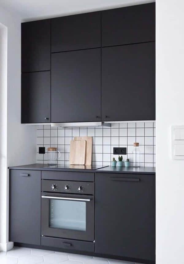 12. White tiles as an alternative to painting walls white, easier to clean and maintain in kitchen areas.