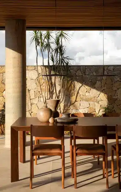 Raw and rustic granite cladding ideal for external and fireplace applications, enhancing natural aesthetics.