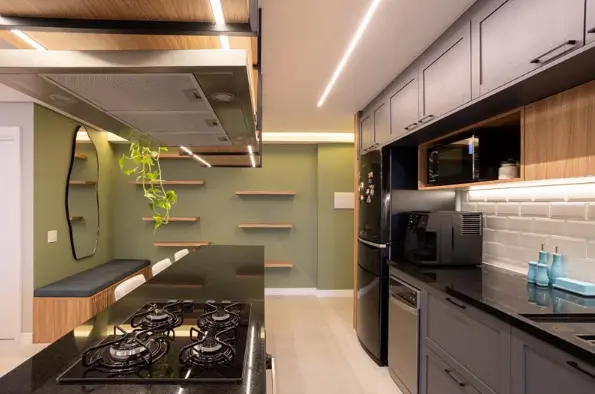 Planned kitchen in L with green furniture + induction cooktop – Project: Ariadne Stein Architecture and Design