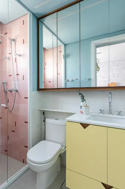 Yellow bathroom cabinet + pastel tones in this children