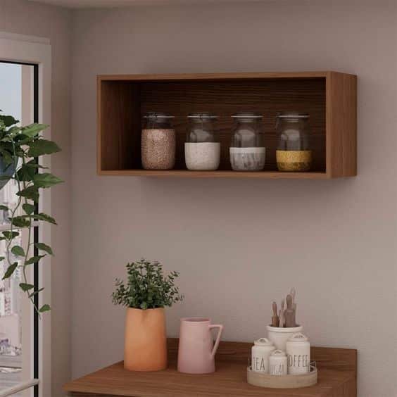 13. The wooden kitchen niche adds sophistication and elegance to the space. The decoration can be done with the utensils themselves, like wine glasses and more colorful pieces to give a fresher touch to the environment.