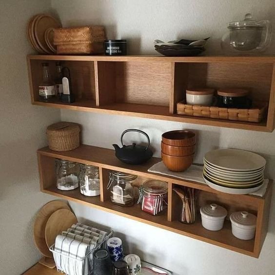 17. Rustic wooden kitchen niches replaced the hanging cabinets, matching the retro-style environment.