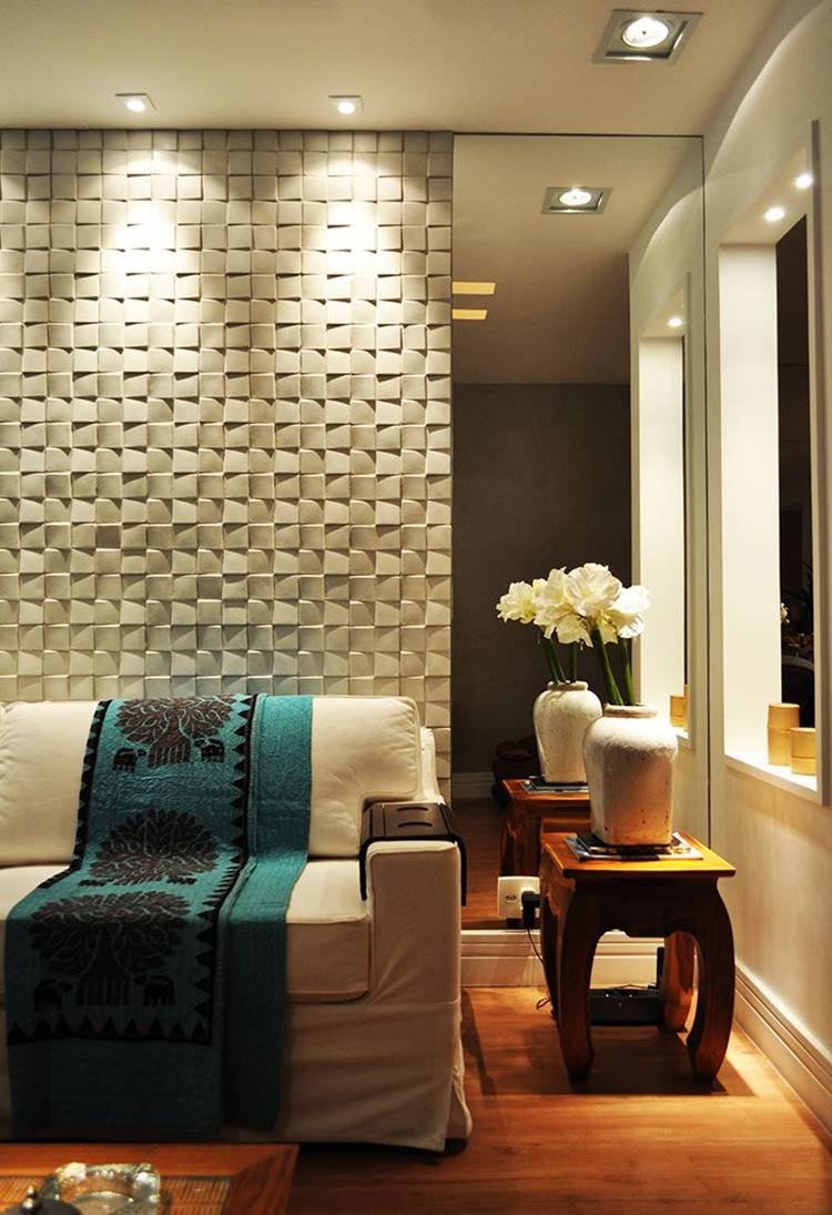 3D plaster wall with embedded mirror, making the home much more elegant and sophisticated.