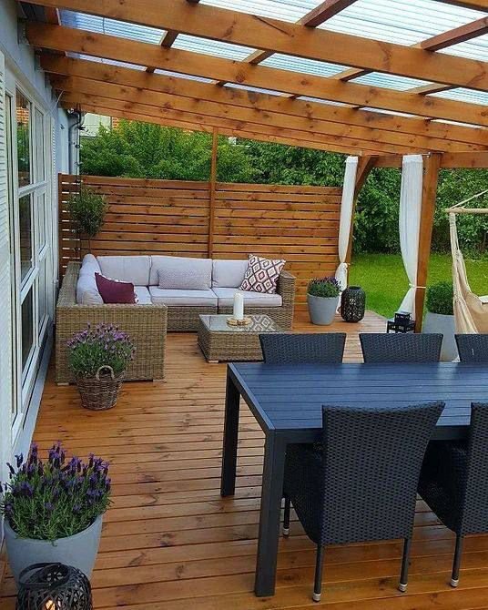 In bungalow style, pergola gains decorations from the ceiling, making the space much more beautiful.