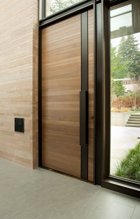 Iron door with an added iron strip at the railing area, enhancing its look.