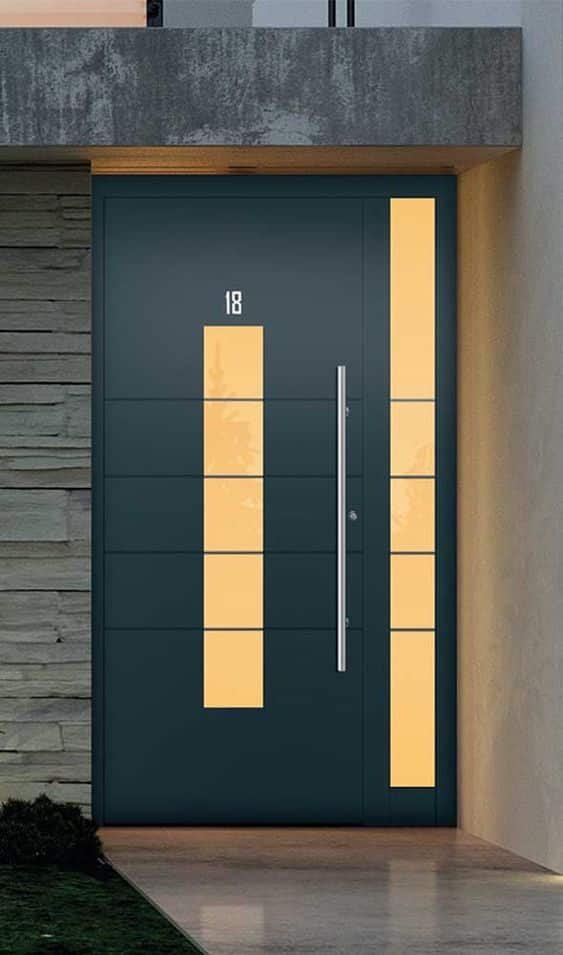 Iron doors featuring decorative glass elements, maintaining longevity with an added visual appeal.