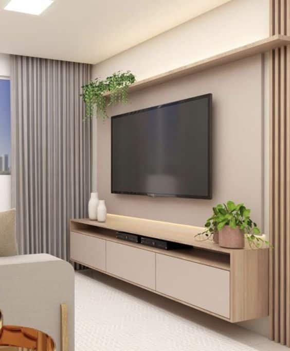 For smaller rooms, it is ideal to bet on minimalism. Therefore, a simpler rack works well, and you can connect it to a suspended shelf to gain more space.