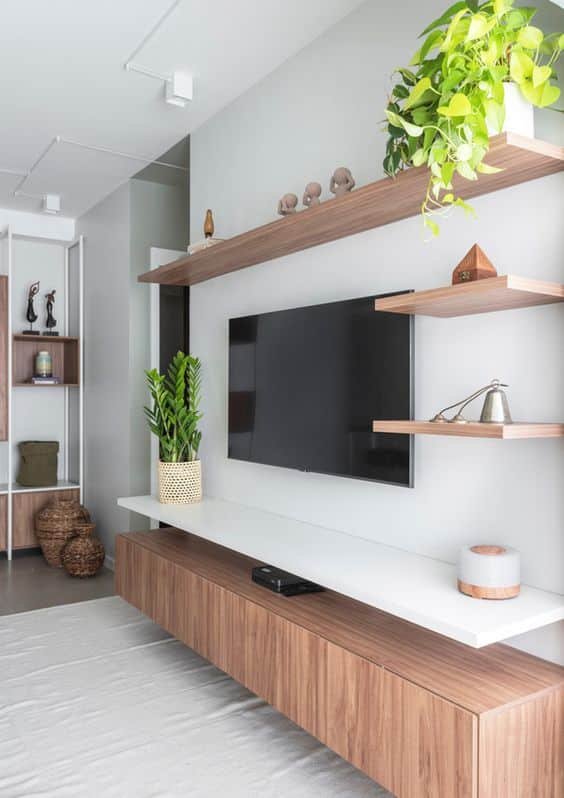 In addition to the top shelf we mentioned, you can also associate the rack with small shelves, creating a very interesting look for the overall context.