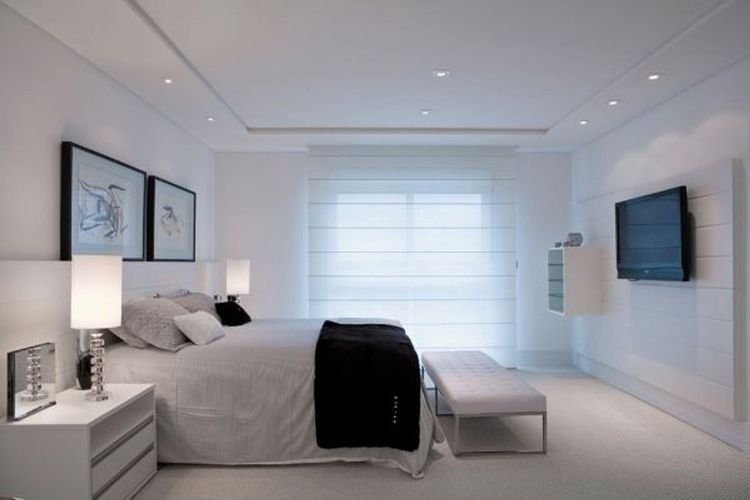 Closed molded cornice is used in this bedroom, coordinating with neutral tones in the entire room