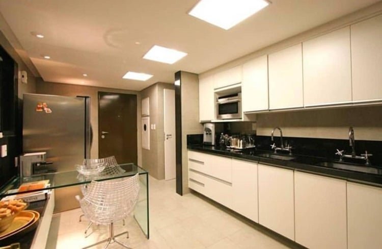 Look at the outcome in this kitchen where the cornice creates a 3D effect and makes the space look larger.