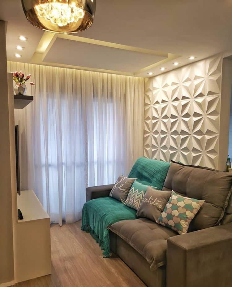 In this living room, the inverted molded cornice combined with LED enhances the lighting much more.