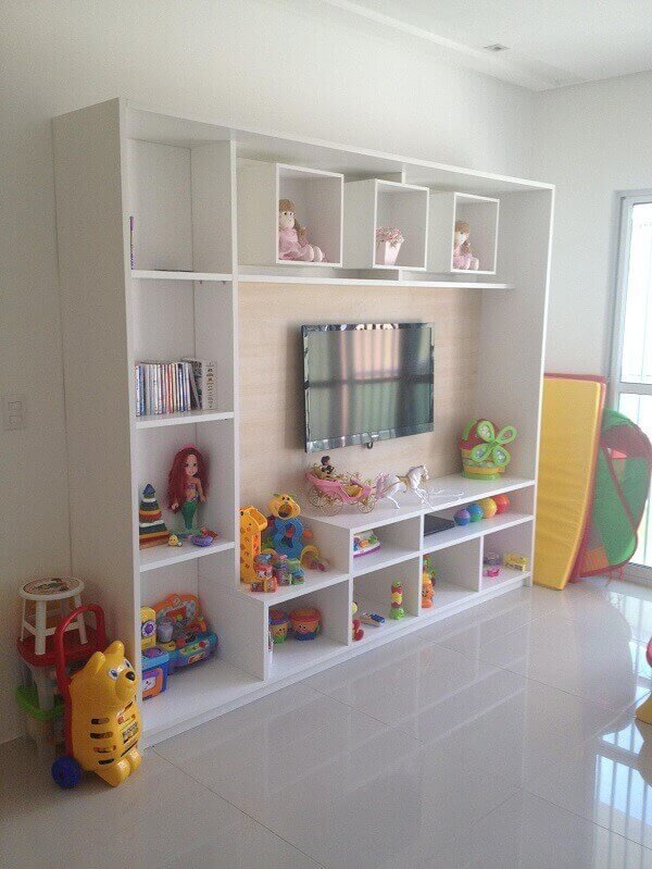 Toy library with white shelf for the room.