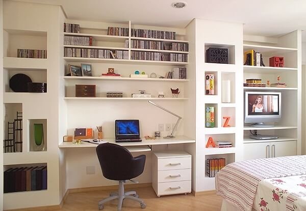 White shelf for the room with various niches.