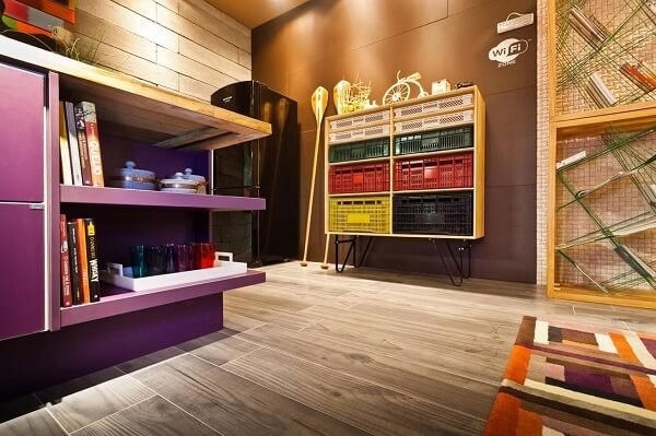 Shelf made from colorful crates.
