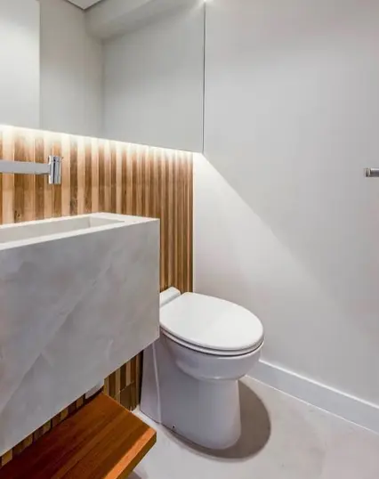 Lavabo de visitas com design elegante e acolhedor.