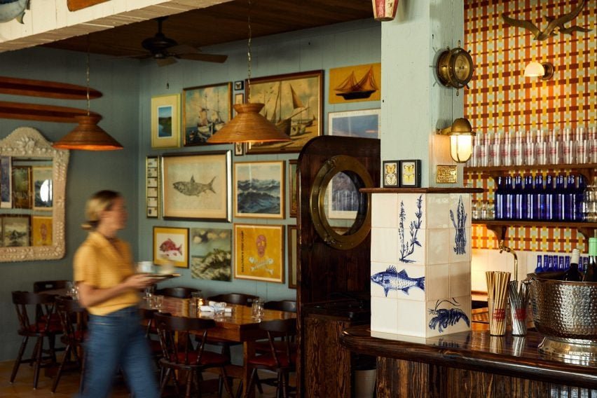 Both vintage and contemporary artworks cover the walls