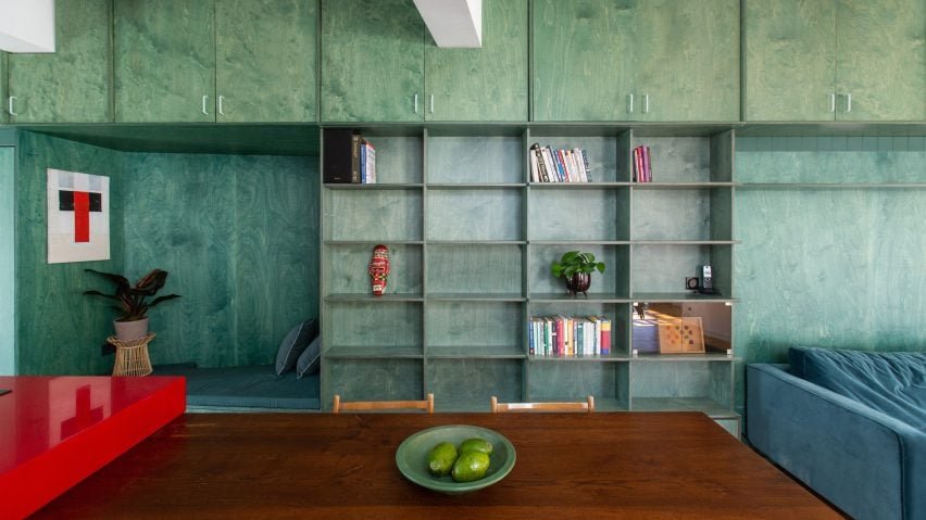 Trikoupi apartment interior featuring bright colors and built-in furniture.